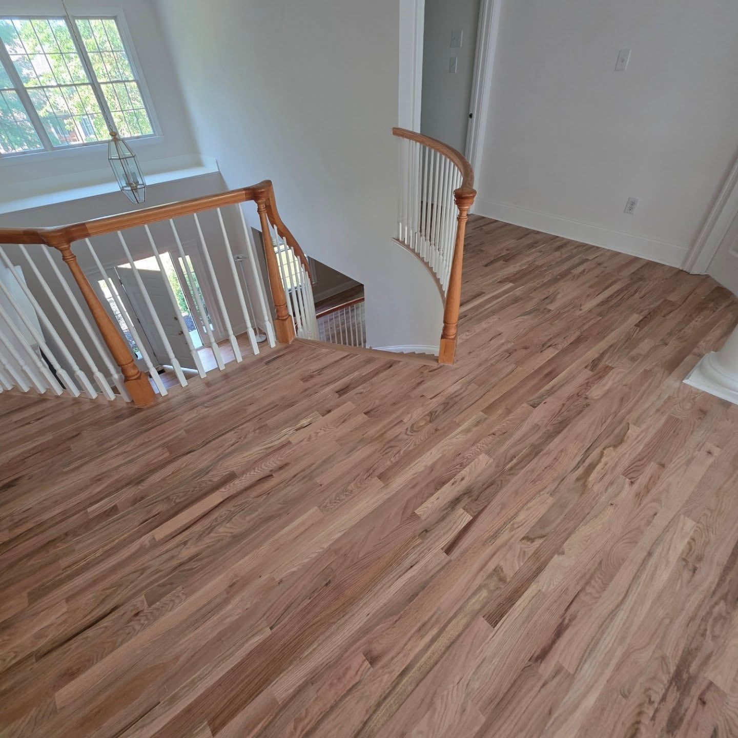 Luxury vinyl plank flooring in a modern hallway